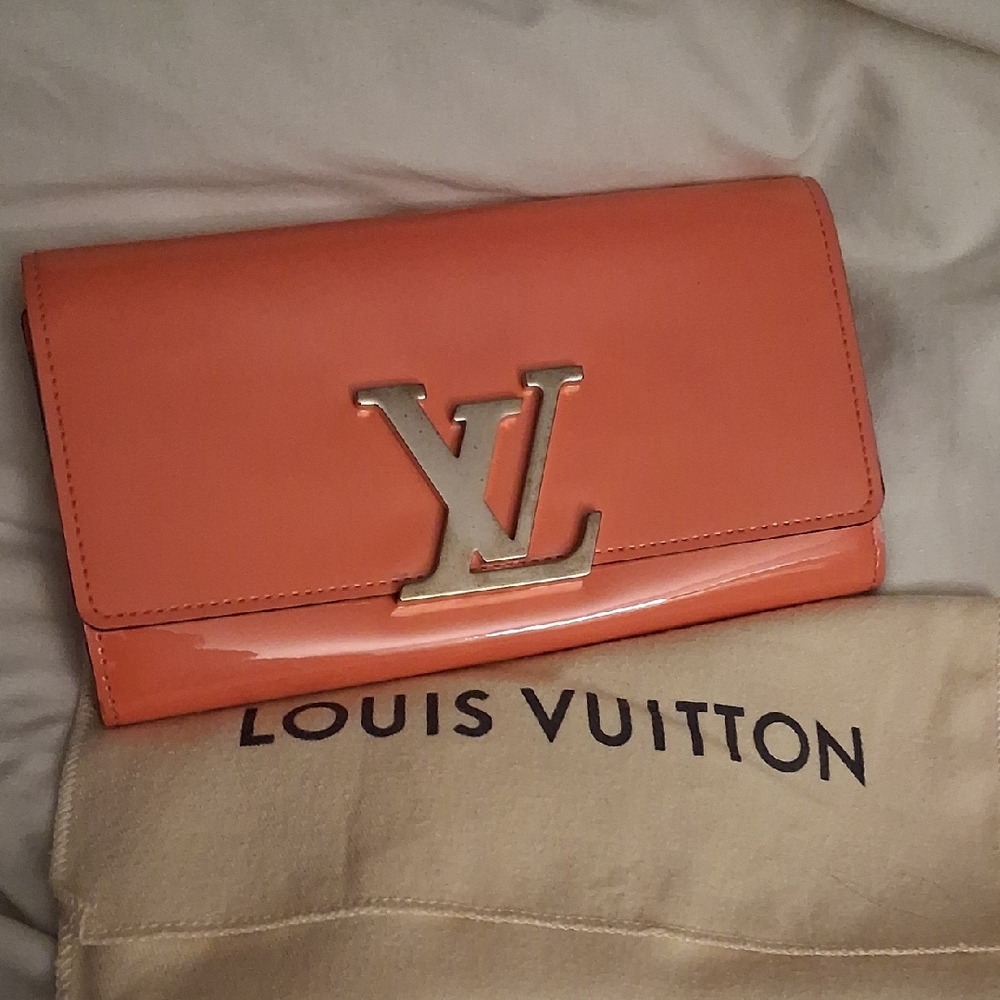 Louis Vuitton Pink Wallet with Silver Logo